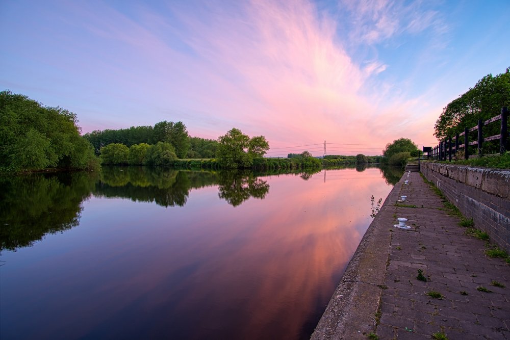 Sunset over a river in West Yorkshire
